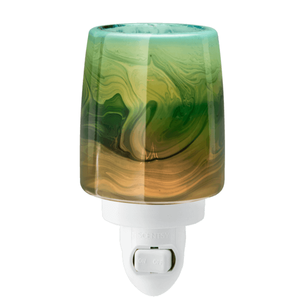 swirled green and yellow glass scentsy candle holder lit up