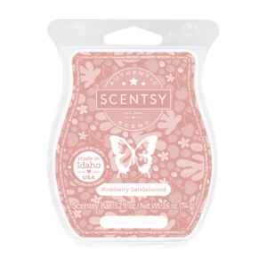 a pink wax warmer with a butterfly design on it